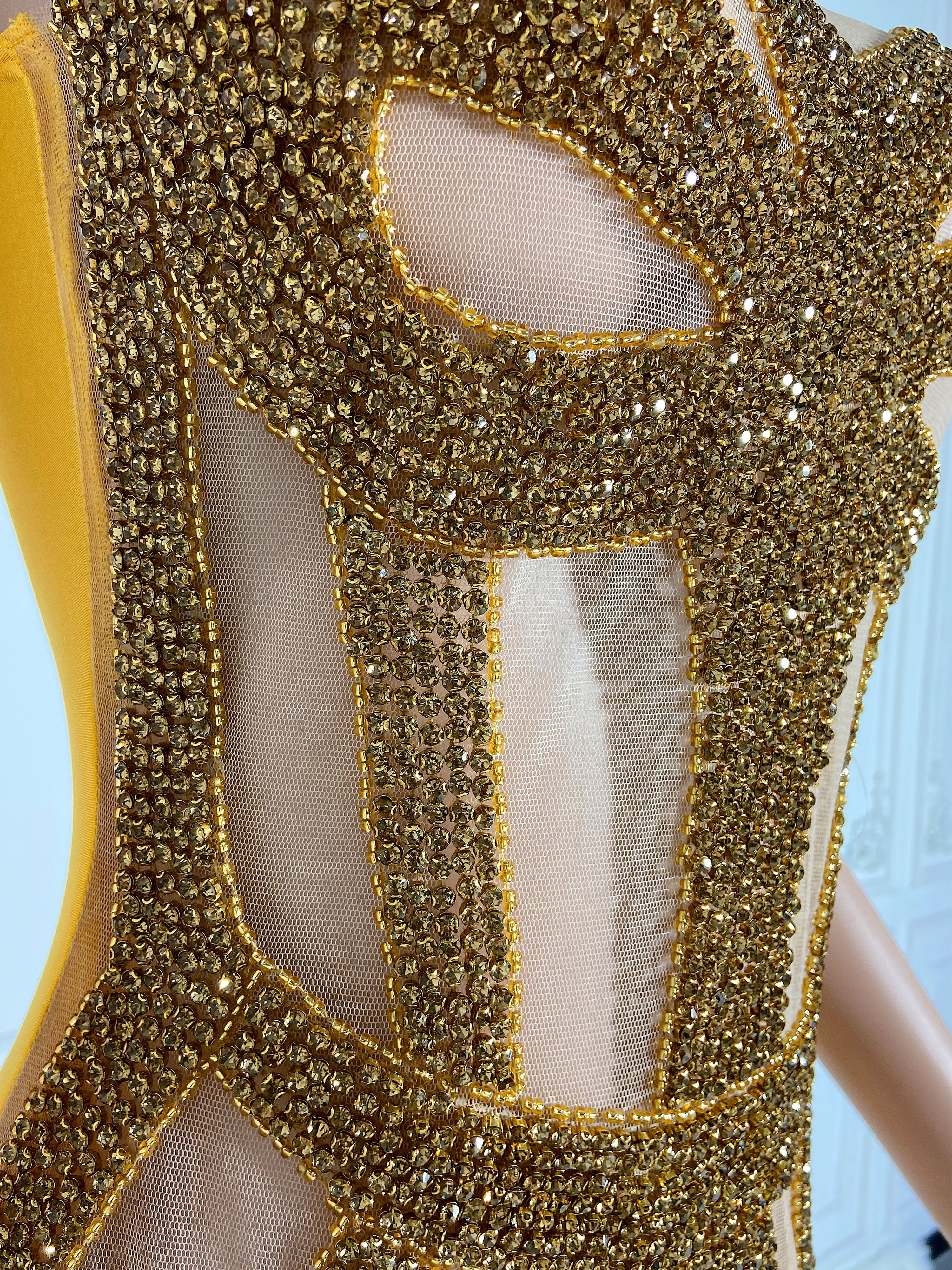 Golden Hollow Elegance Mini Dress